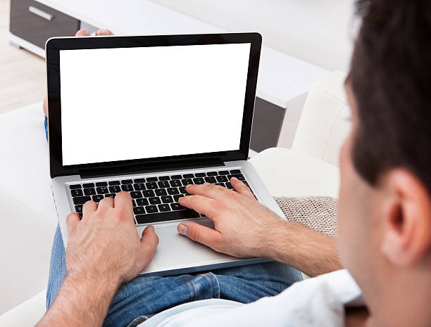 istock Close-up Of Man Using Laptop 507399463