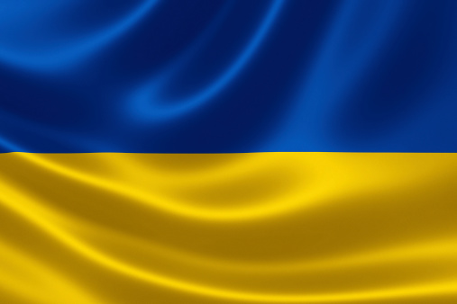 3D rendering of Ukraine's flag on satin textile texture.