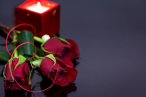 istock Valentine's day - red roses on dark background 507400724