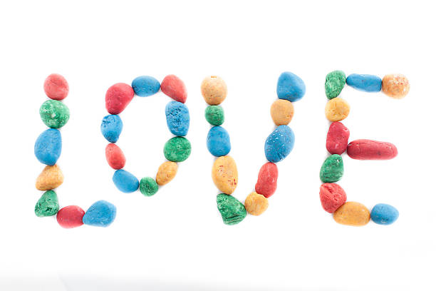 istock Colorful stones arranged in a word love 507401180