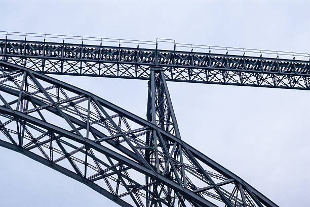 istock Pylon truss of gray railway arch bridge 507402291
