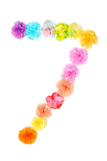 istock Number 7 alphabet flowers made from paper craftwork 507402488