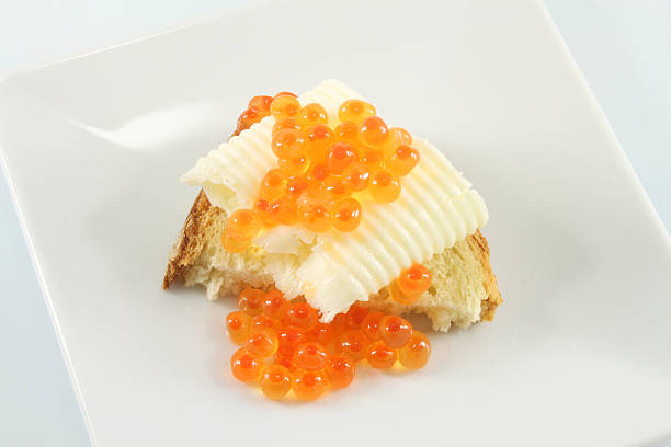 istock Butter and red caviar, closeup 507402619