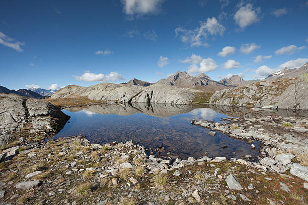 istock Alpine lake in the Alps at fall 507402904