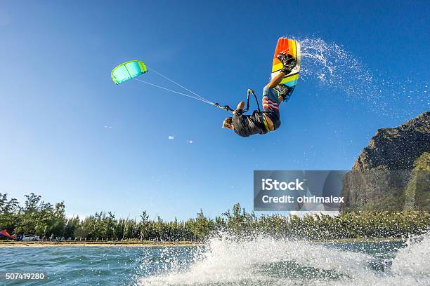 Kiters Trick Stock Photo - Download Image Now - Kiteboarding, Mauritius, Extreme Sports