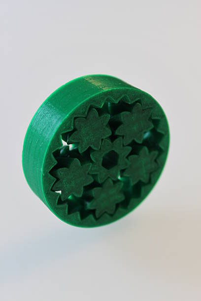 3D printed gear bearing 3D printed planetary gears in dark green polylactic acid stock pictures, royalty-free photos & images