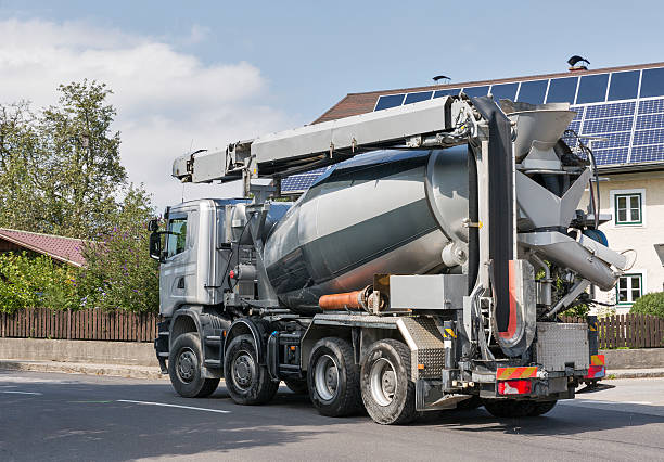 istock concrete mixer machine on city street 507422900
