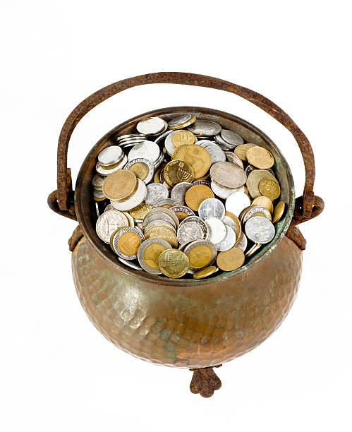 istock antiquarian pot of coins 507424284