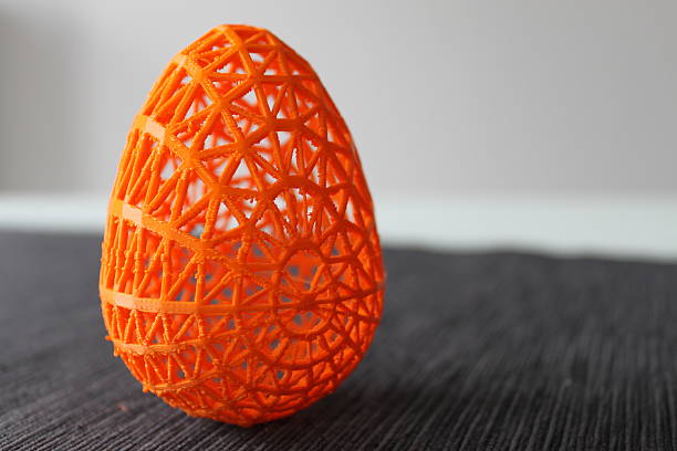 3D printed parametric easter egg 3D printed parametric easter egg on black underground polylactic acid stock pictures, royalty-free photos & images