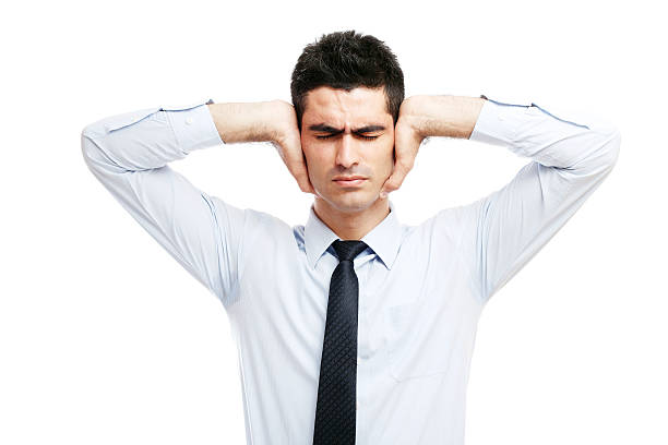 istock Businessman holding his hands in his ears 507427710