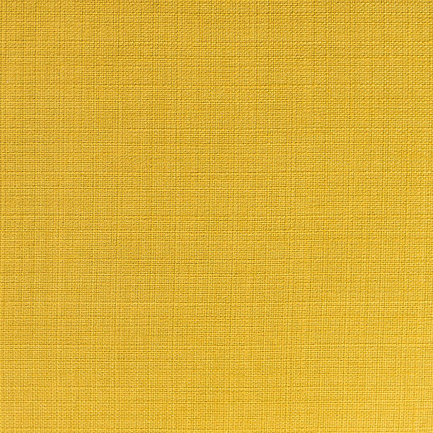 istock close up of yellow fabric pattern 507428364