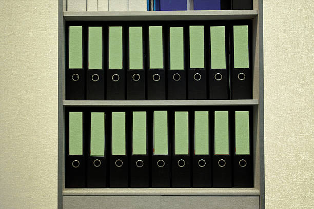 istock folders standing on the shelves vintage background 507429205