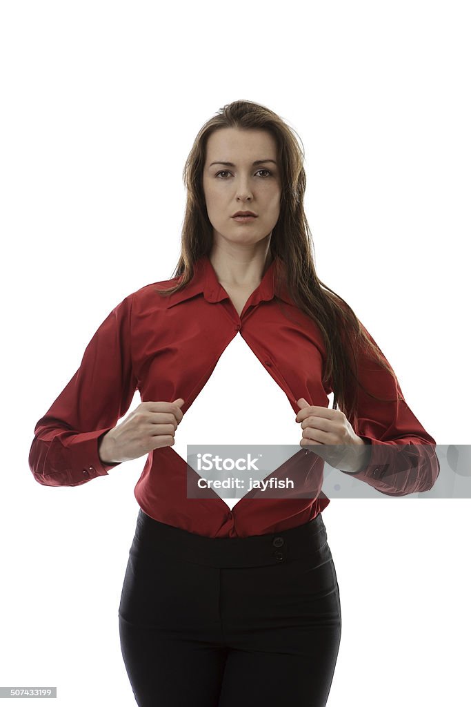 superhero attractive businesswoman pulling her shirt apart doing a superhero business poses Chest - Torso Stock Photo