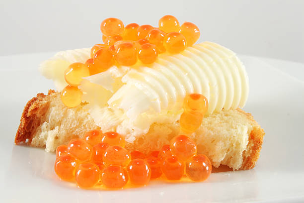 istock Butter and red caviar, closeup 507434145