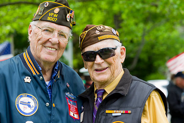 Veterans of World War II Veterans of World War II at a Memorial Day service. military photos stock pictures, royalty-free photos & images