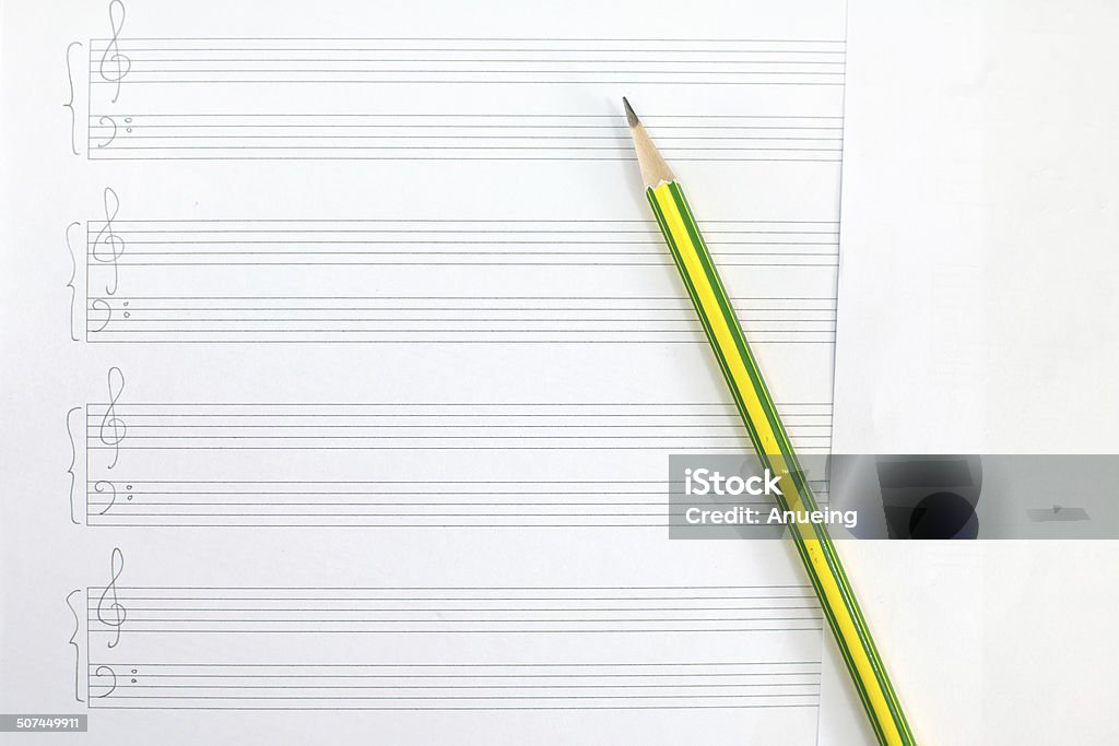 Empty music sheet with pencil Backgrounds Stock Photo