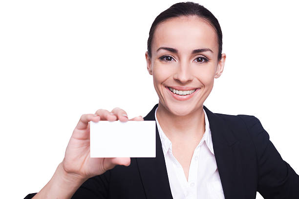istock Woman with business card. 507450489