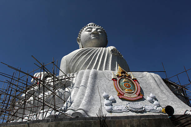 Phuket´s Big Buddha Phuket's Big Buddha is one of the island's most important and revered landmarks. The huge image sits on top of the Nakkerd Hills between Chalong and Kata and at 45 metres high it is easily seen from far away. puket stock pictures, royalty-free photos & images