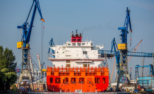 Charleston, SC, USA - August 02, 2023: Fortune, a 367-meter container vessel owned by China Ocean Shipping Company and flagged to Hong Kong, sails into Charleston Harbor.