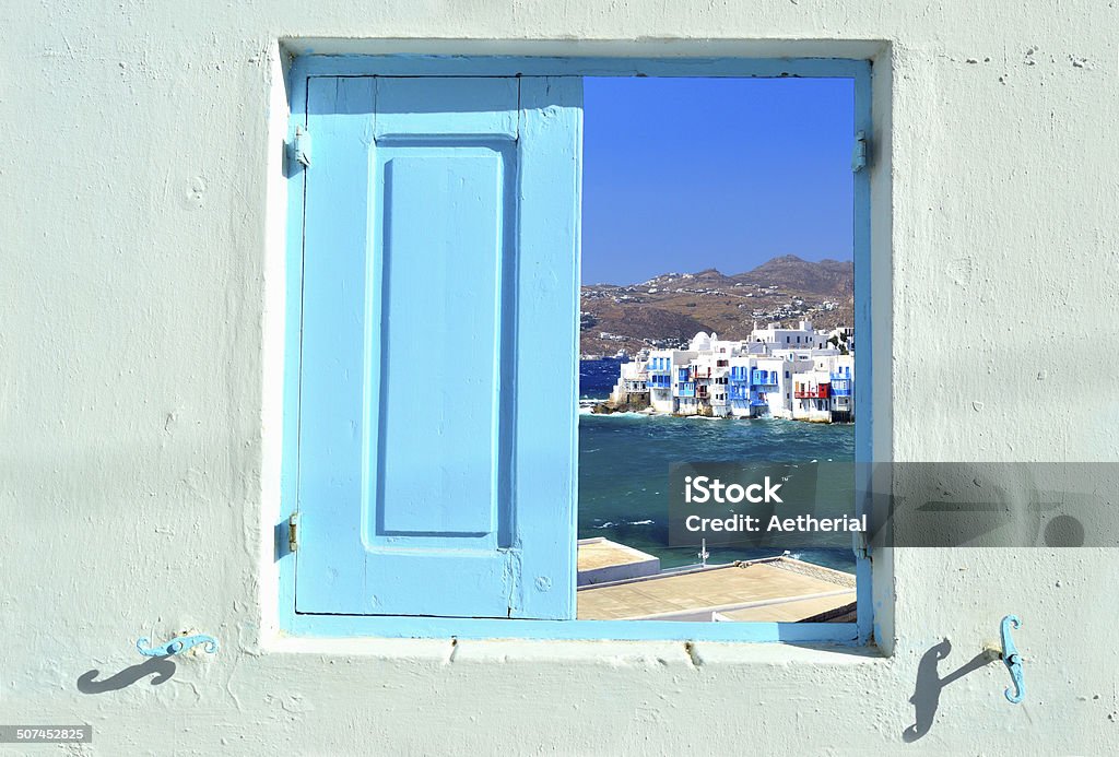 Window into beauty of Greece Travelling concept - window into beauty of Greece and Cyclades islands showing Little Venice in Mykonos Aegean Sea Stock Photo