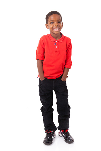 Portrait of a cute african american little boy smiling, isolated on white background