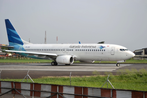 bandung, indonesia-june 16, 2014: Garuda Indonesia airline taking manoeuvre on husein sastranegara airport bandung.
