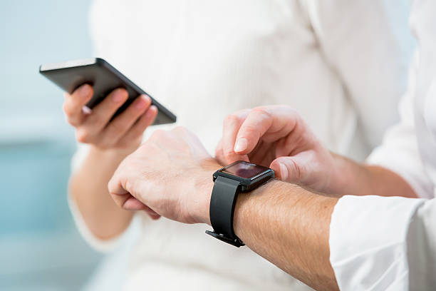 istock Woman and Man with smart watch 507454546