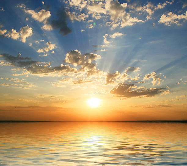 istock sunset at coast of the sea 507455276