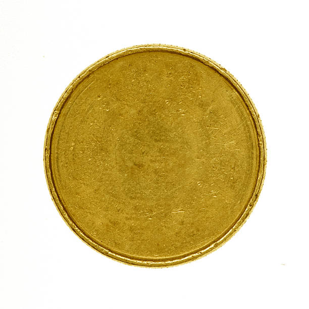 istock Blank yellow coin isolated on white 507455308