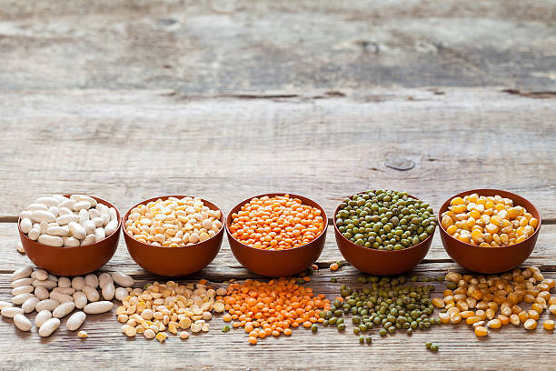 istock Cereal grains: red lentils, green mung, corn, bean and peas 507457384