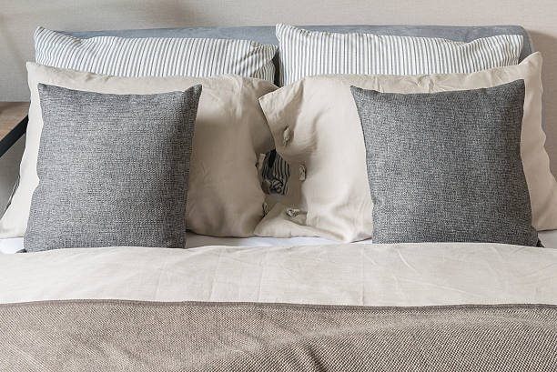 istock grey pilows on bed in modern bedroom 507458260
