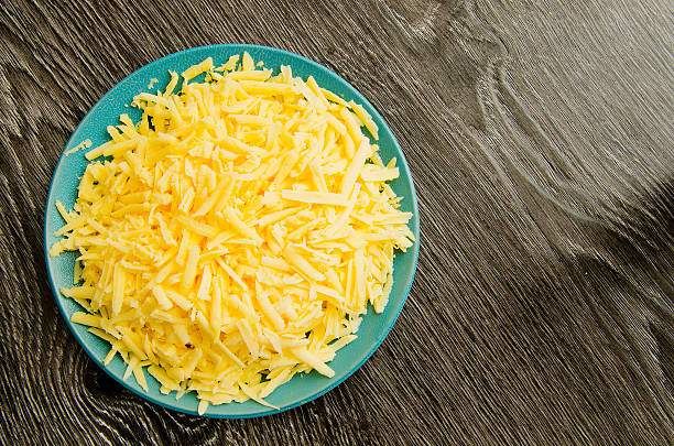 queijo ralado - food and drink cheese grated bowl - fotografias e filmes do acervo