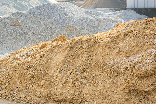 istock Yellow and gray piles of sand 507461650