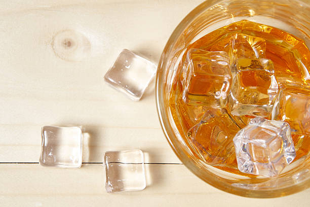 istock Glass of whiskey with ice 507473226