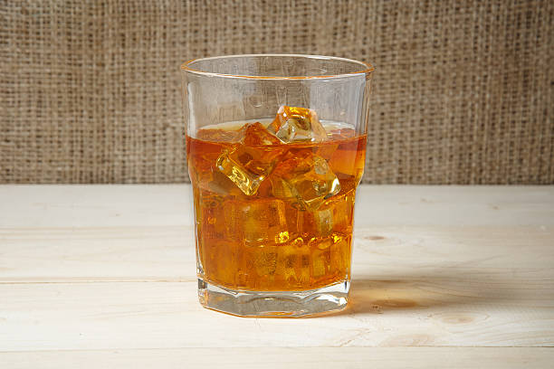 istock Glass of whiskey with ice 507473332