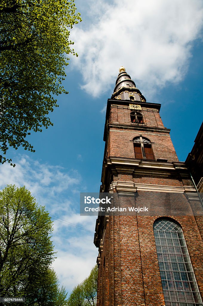 Vor Frelsers Kirke (Tower) - Copenhagen - Denmark Vor Frelsers Kirke (Tower) - Copenhagen Bell Tower - Tower Stock Photo