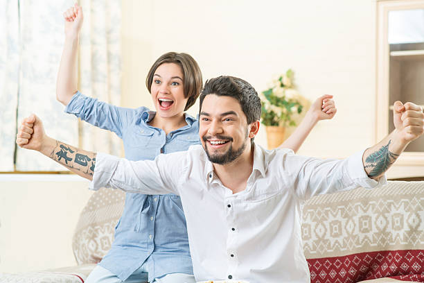 istock Happy couple feeling jubilant 507475620