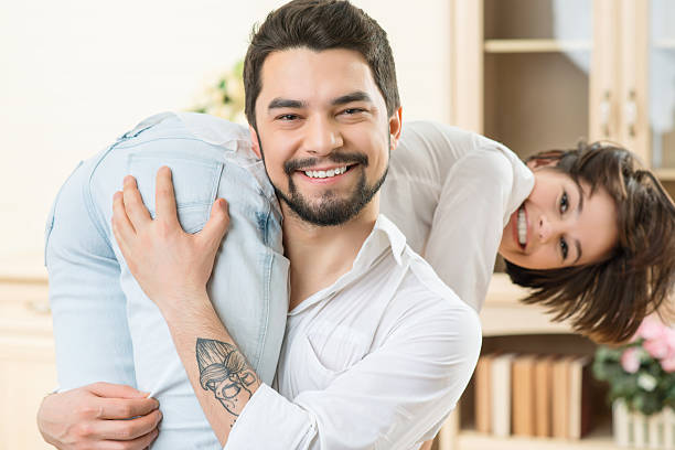 istock Handsome husband holding his wife 507475826