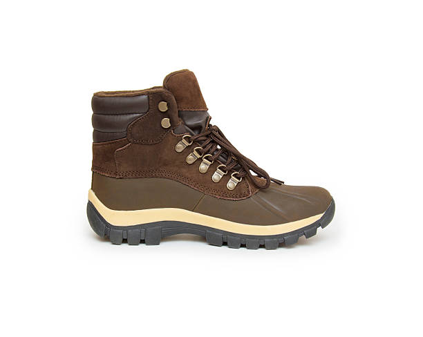 istock pair of new boots on white background 507477814