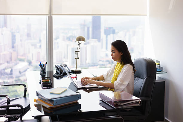 istock Business Woman Secretary Typing On Laptop Computer In Office 507479070