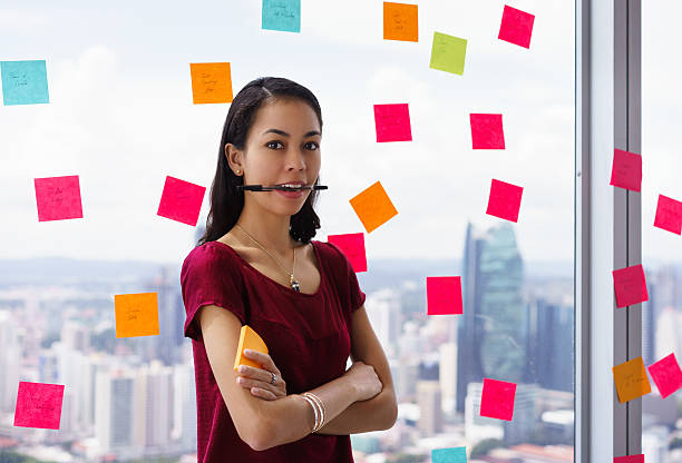istock Portrait Busy Person With Many Sticky Notes On Office Window 507479174