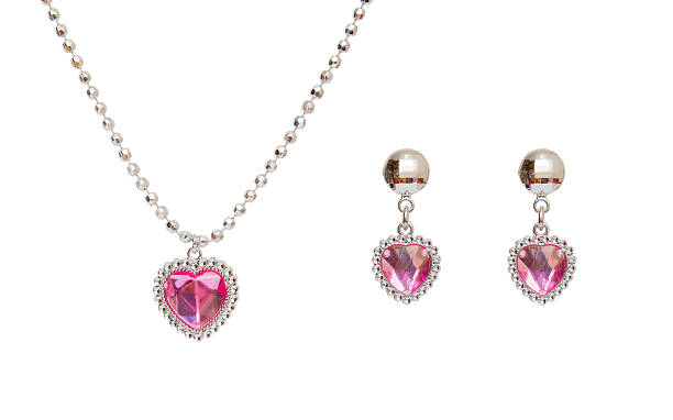 istock Silver earrings and necklace isolated on the white background 507481260