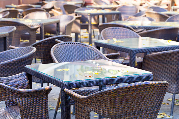 istock Empty autumn coffee terrace with tables and chairs. 507486367