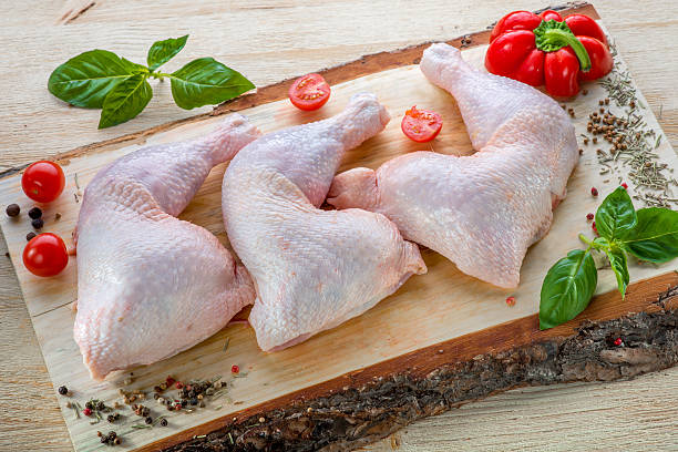 istock Raw chicken breasts on wood 507489459