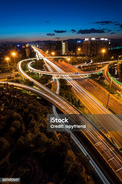 Urban Highway Traffic At Night Stock Photo - Download Image Now - Activity, Architecture, Blue