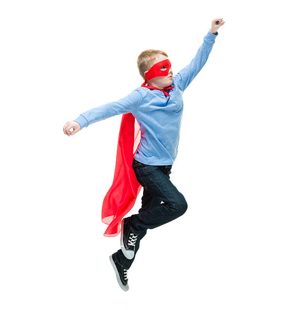 istock Little boy acting like superman and flying 507492716