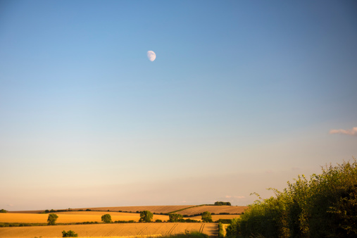 An rely evening moon over the Yorkshire Wolds, England
