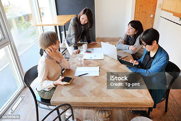 Business Women In A Meeting Room Stock Photo - Download Image Now - Business Meeting, Japanese Ethnicity, New Business