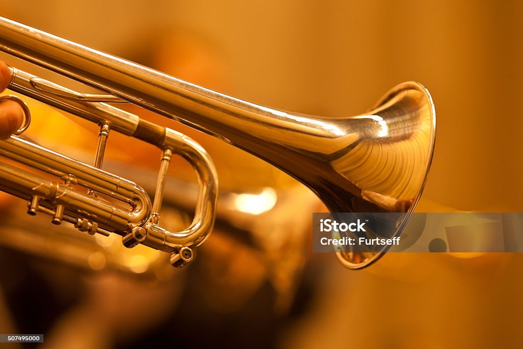 Detail of the trumpet closeup Detail of the trumpet closeup in golden tones Trumpet Stock Photo