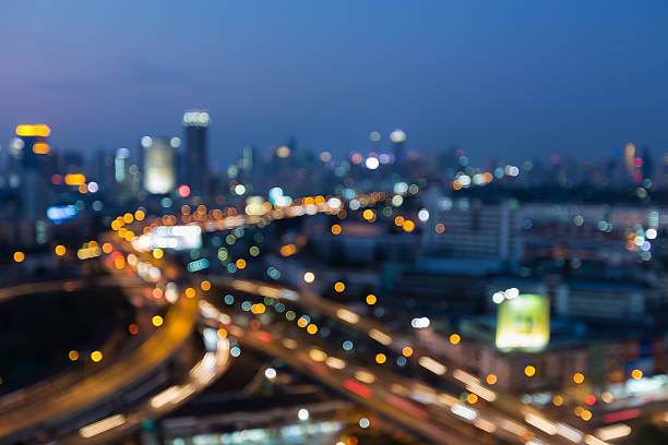 istock Abstract city blurred bokeh light background night view 507496574